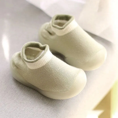 Detailed view of the knit pattern and soft sole of baby boots