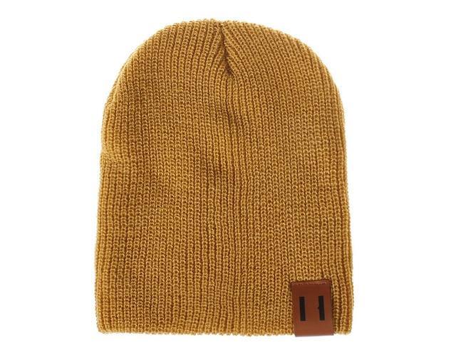 Detail of knitted texture on a unisex baby hat, warm crochet beanie for chilly days