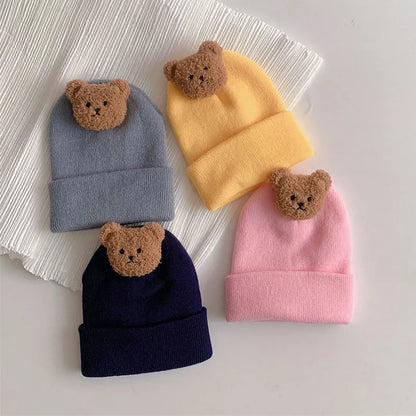 Essential baby winter headwear: a soft knitted bear beanie hat, suitable for any infant