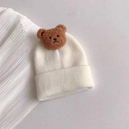 Baby accessories: a warm, knitted bear hat designed for comfort and style in winter