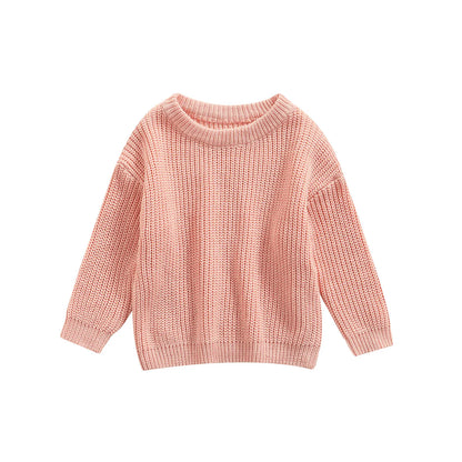 Knitted baby sweater displayed flat, highlighting its unisex design and long sleeve comfort