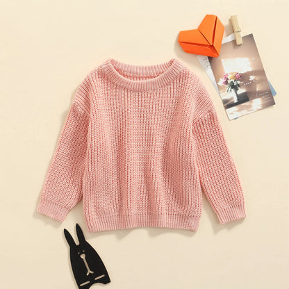 Back view of a plain knitted baby pullover, unisex toddler outerwear long sleeve