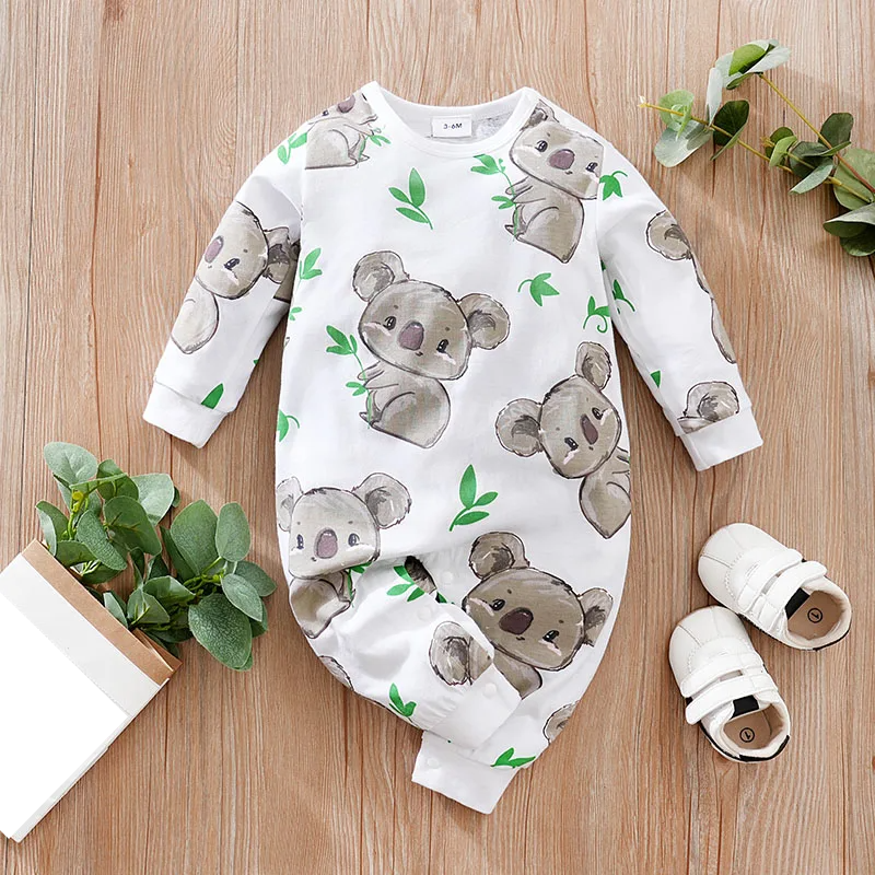 Close-up of unisex baby cotton bodysuit with adorable koala cartoon print, baby shower gift