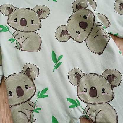 Detail of koala cartoon on a unisex white baby bodysuit, newborn essentials item