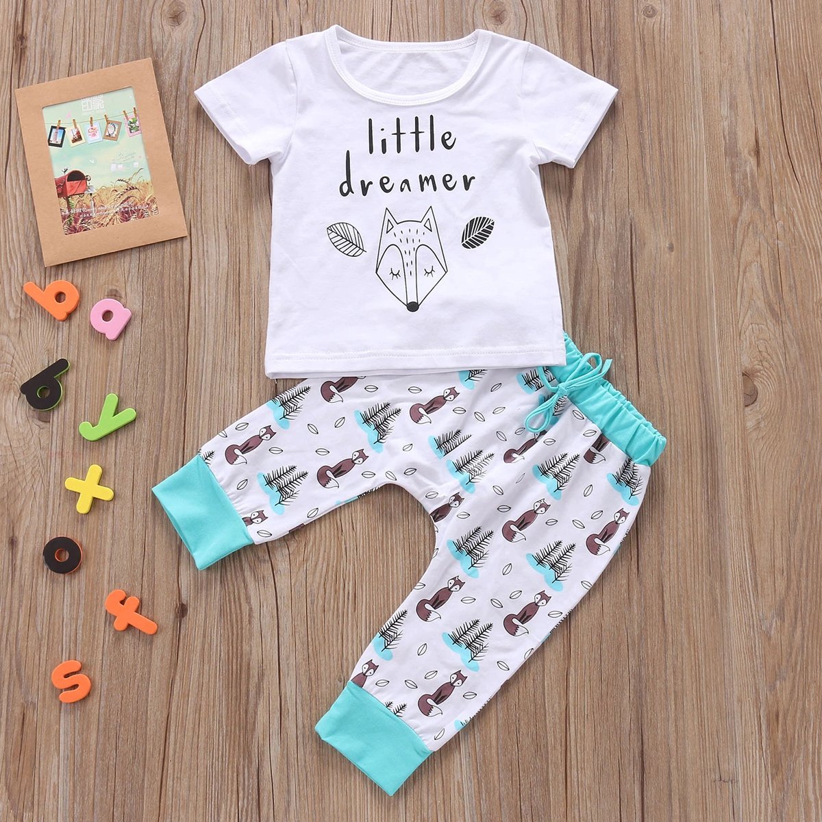 Full view of unisex baby 'Little Dreamer' deer print cotton set, perfect sleepwear.