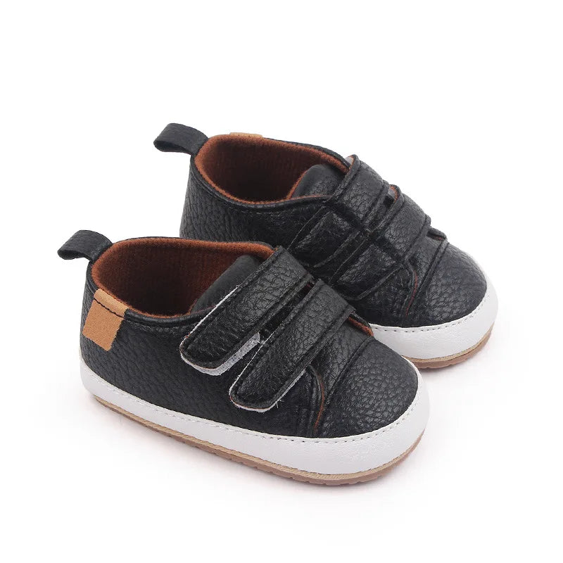 Close-up of rubber sole on unisex baby non-slip sneakers for grip