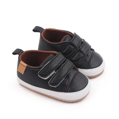 Close-up of rubber sole on unisex baby non-slip sneakers for grip