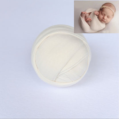 Gentle cotton blend baby wrap blanket, perfect for infant comfort during photo sessions