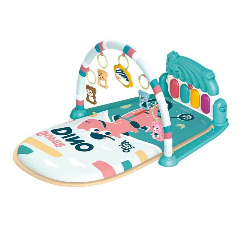 Side view of infant observing dangling toys on a musical activity gym play mat, promoting focus.