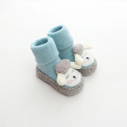 Unisex baby soft sole plush shoes, anti-slip infant booties featuring cute cartoon animals.