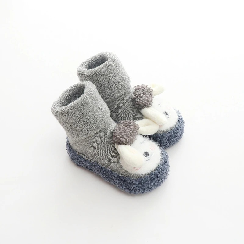 Warm lined toddler shoes: unisex baby plush anti-slip footwear with a fun cartoon design.