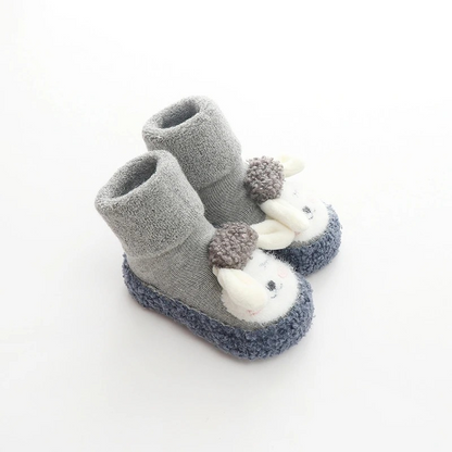 Warm lined toddler shoes: unisex baby plush anti-slip footwear with a fun cartoon design.