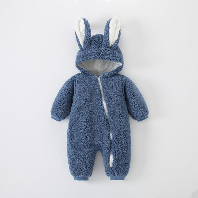 Front view of a unisex baby rabbit ear sherpa onesie, white cotton blend newborn outfit.