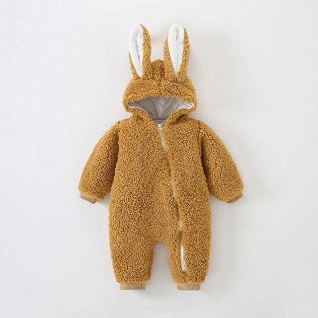 Close-up of the rabbit ear detail on a unisex baby sherpa onesie, soft and cozy.
