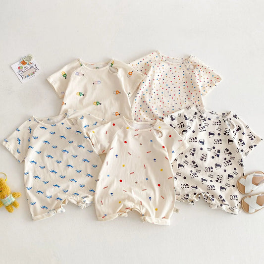Unisex baby romper with a playful submarine print, featuring snap closures for easy diaper changes.