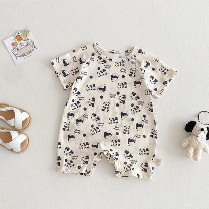 Three unisex baby rompers in various playful designs, essential for comfortable baby wear.