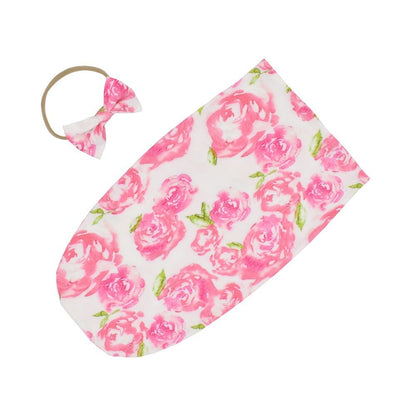 Unisex baby sleeping bag designed for safe sleep, includes a cute matching cotton headband.