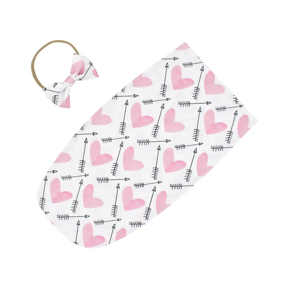Baby sleeping bag and headband set, showcasing a practical design for easy swaddling.