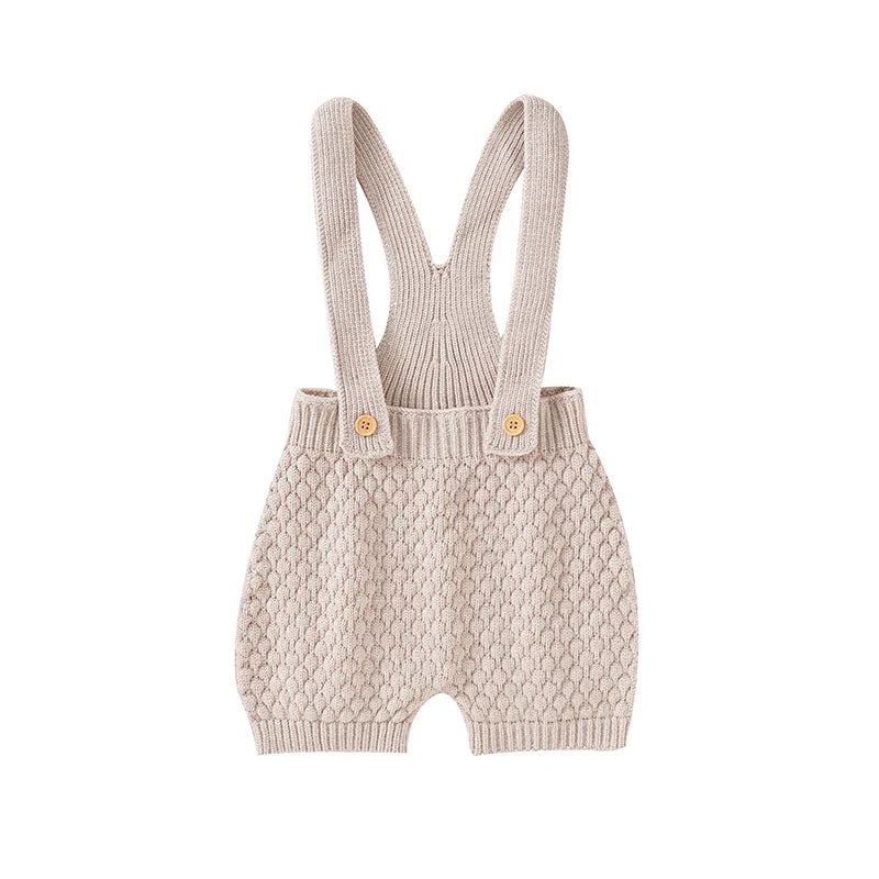 Acrylic knit sleeveless infant outfit, perfect for sunny days and active babies.