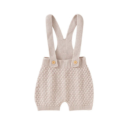 Acrylic knit sleeveless infant outfit, perfect for sunny days and active babies.