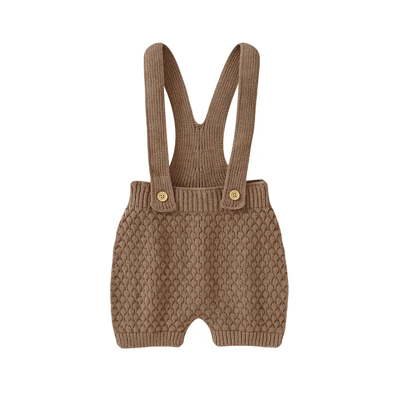 Gender-neutral baby romper for newborns, designed for ultimate comfort and breathability.