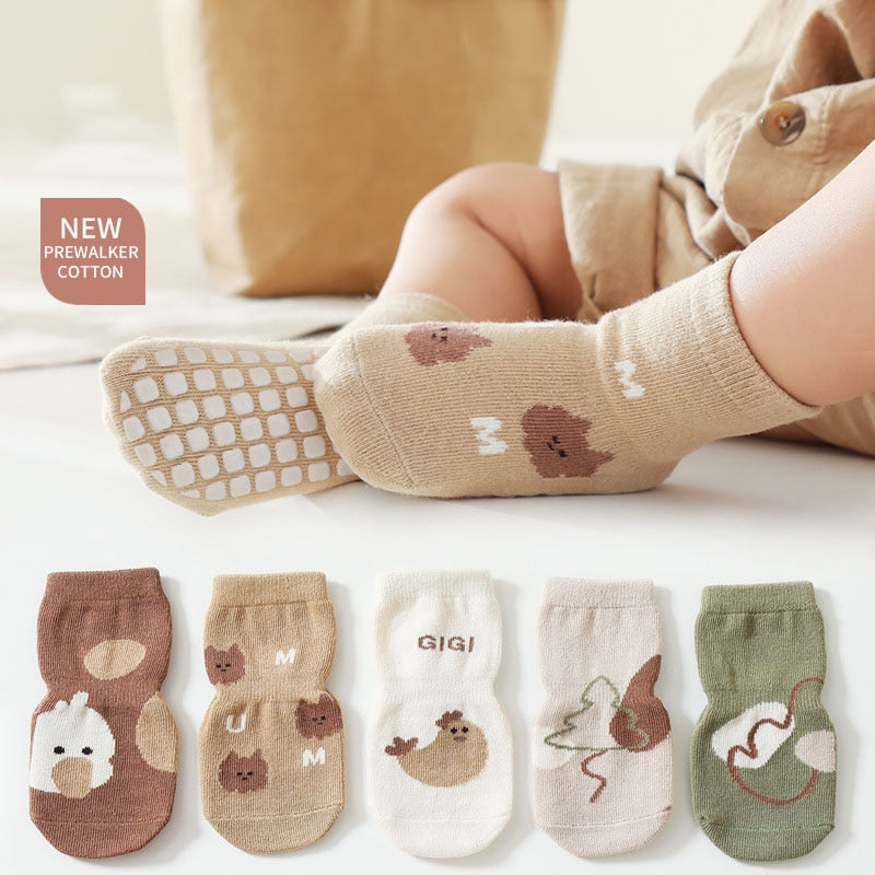 Toddler cotton floor socks featuring an adorable cartoon animal, providing non-slip protection