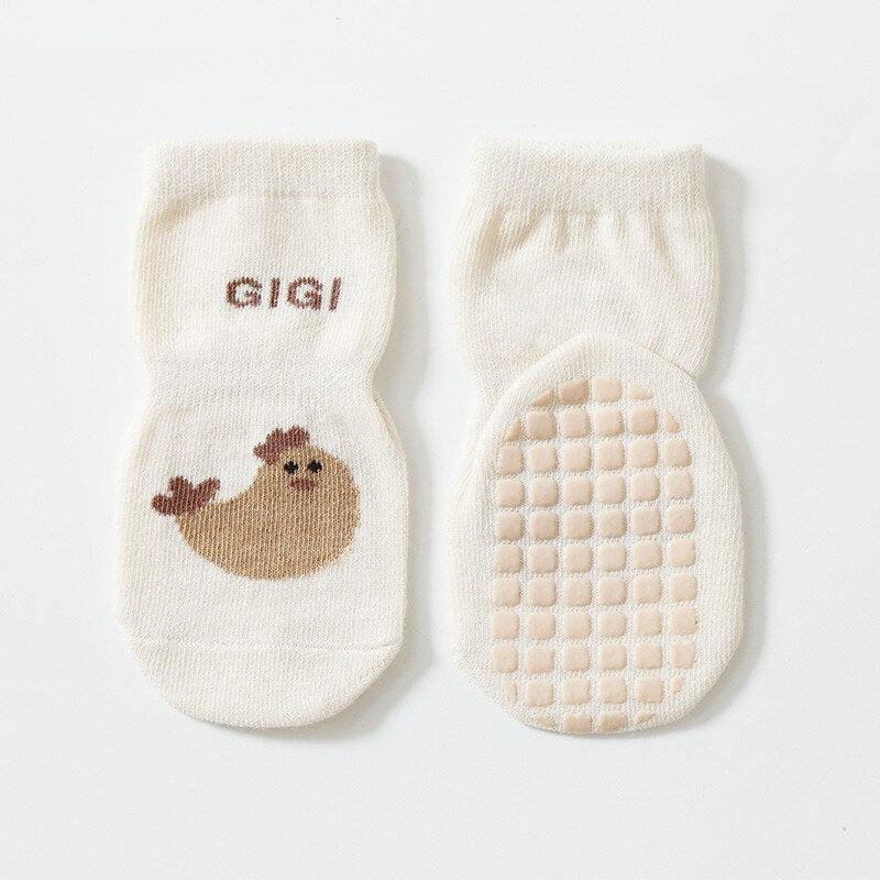 Soft baby socks with a charming cartoon animal print and reliable anti-slip soles for floor safety