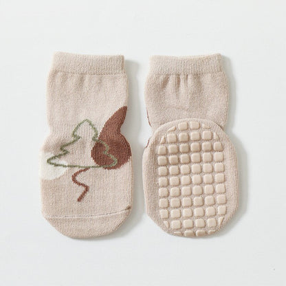 Anti-slip floor socks for kids, showcasing a cute cartoon animal design, ideal for infant apparel