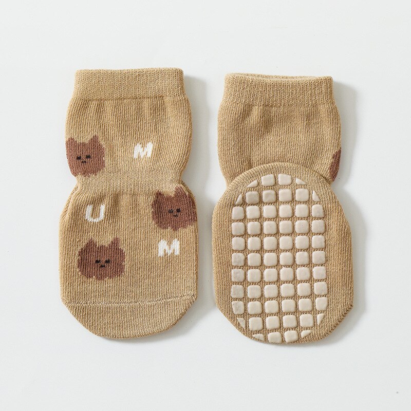 Cotton toddler socks with a playful cartoon animal, designed for ultimate anti-slip safety indoors