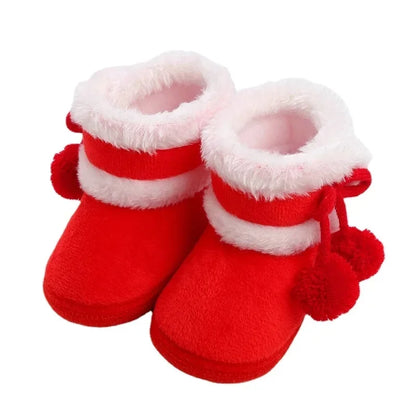 Soft sole baby footwear in a gender-neutral design, ideal for crib and play.