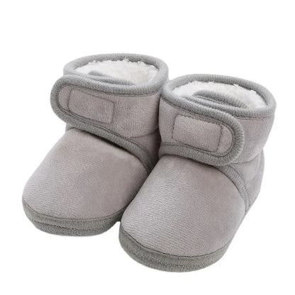 Side view of baby first steps shoes, highlighting the anti-slip sole for safety.