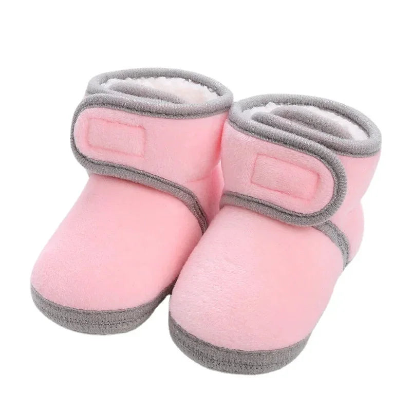 Unisex infant crib shoes with anti-slip grip, promoting natural foot development.