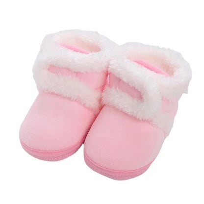 Close-up of the anti-slip sole on baby first steps crib shoes for safety.