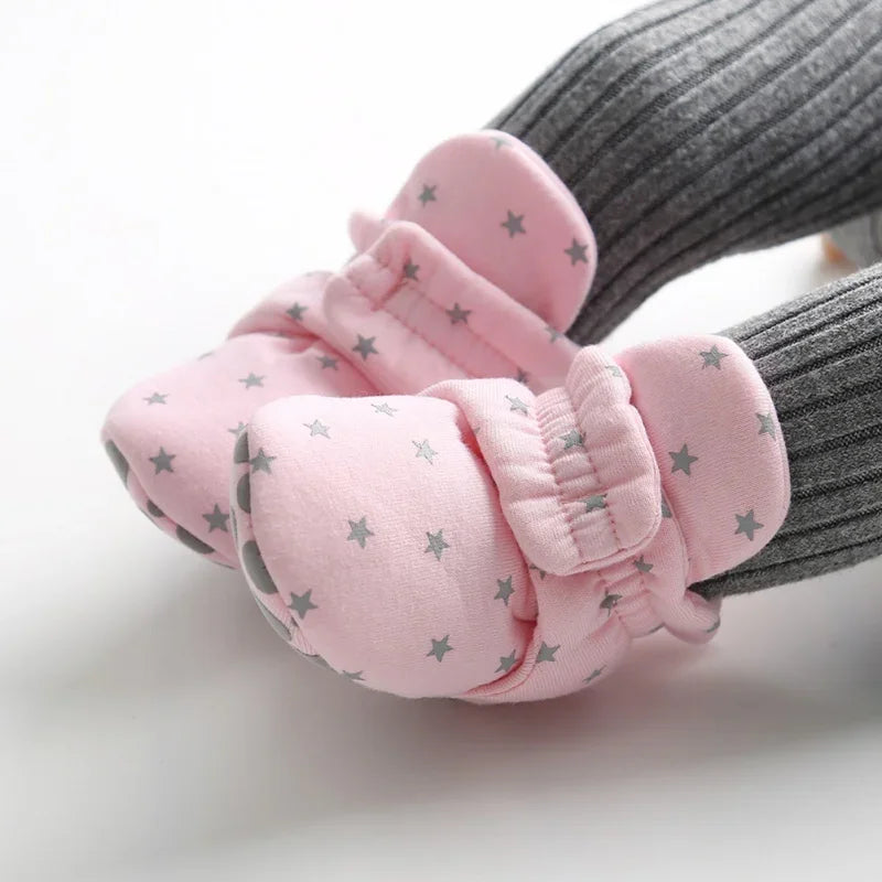 Soft sole crib shoes for baby's first steps, ensuring comfort and security.