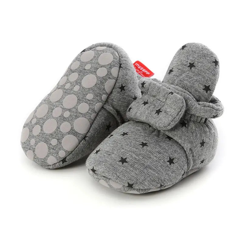 Close-up of the soft fabric on anti-slip baby crib shoes, ensuring comfort.