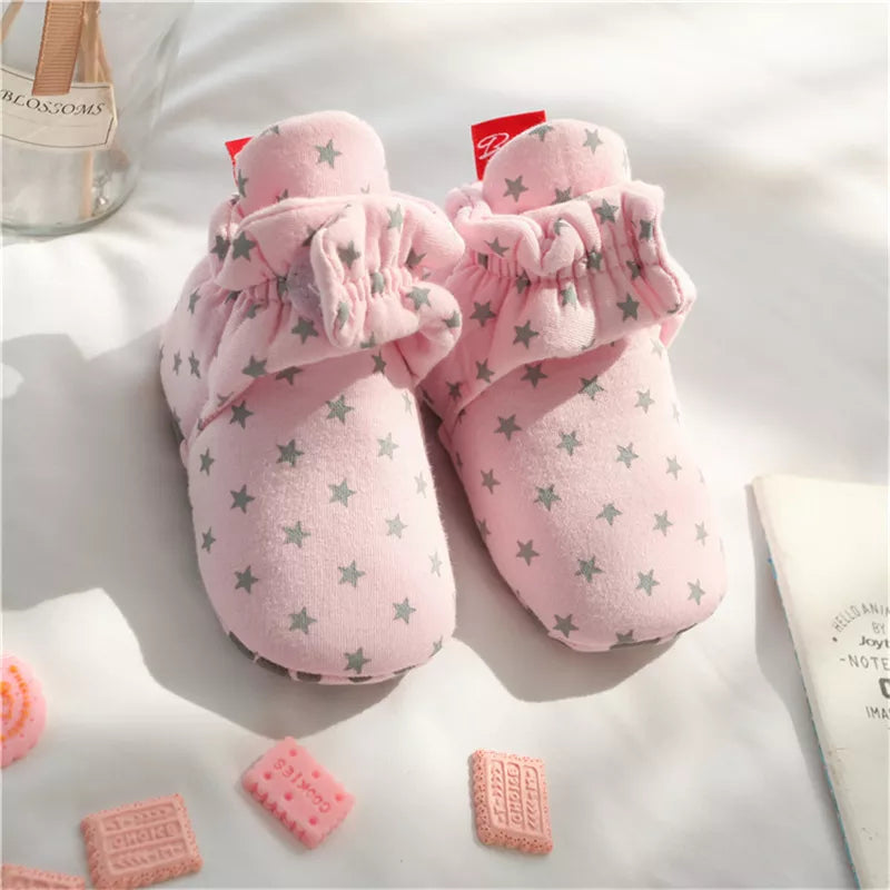 Soft sole anti-slip baby shoes, essential for indoor playtime and exploration.