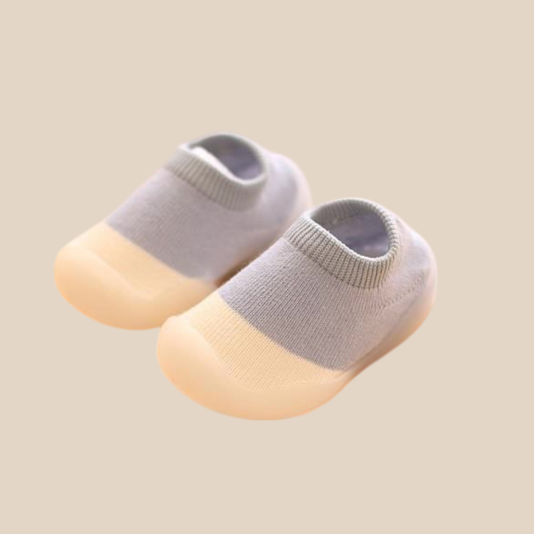 Unisex baby soft sole first walker shoes in white, perfect for new walkers and infants