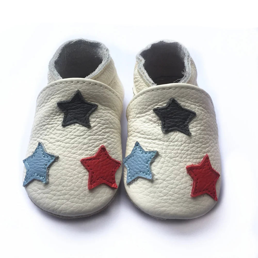 White unisex baby leather booties, soft sole non-slip, perfect for all outfits