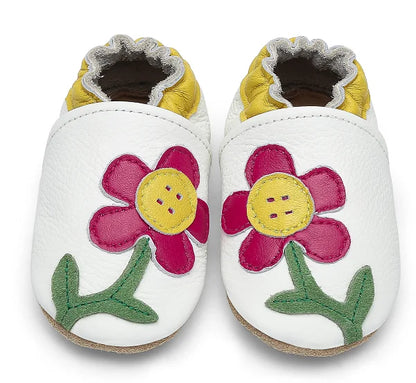 Side view of infant soft sole leather booties, highlighting design