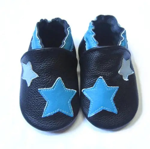 Top-down view of unisex non-slip leather booties for baby