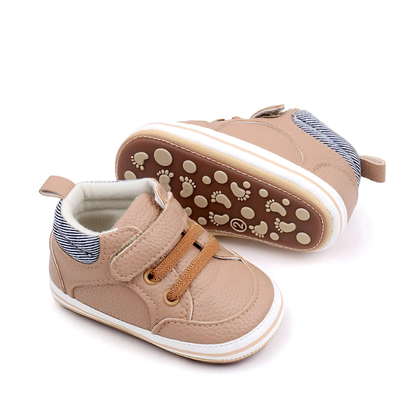 Infant unisex footwear, soft sole baby shoes with easy hook and loop closure.