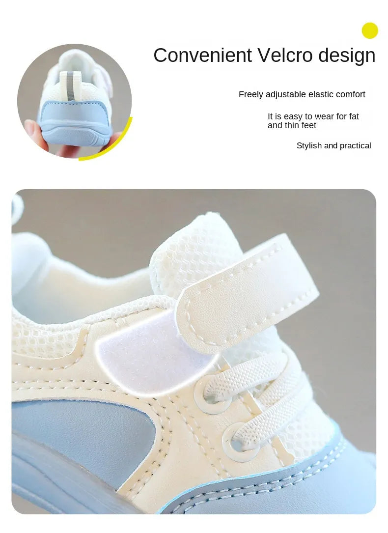 Detail shot of the breathable mesh on a unisex baby sneaker, ensuring comfort.