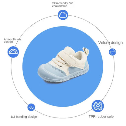 White unisex baby sneakers with breathable fabric and soft sole, designed for infant comfort.