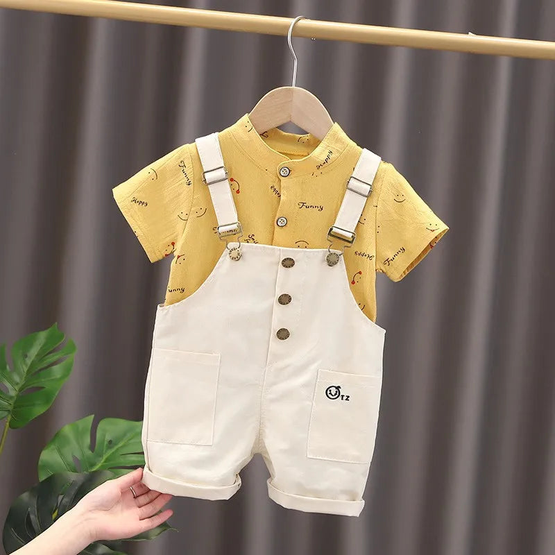 Toddler casual tracksuit set in white cotton, short-sleeved top and matching shorts for summer comfort