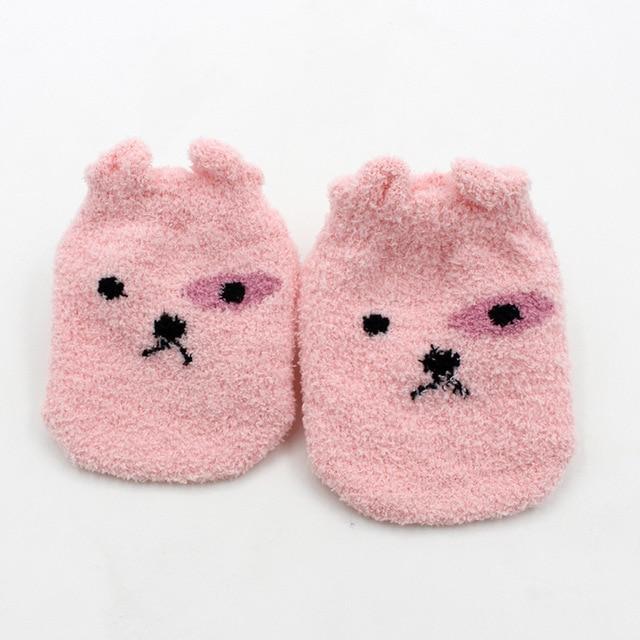Close-up view of the cozy texture of unisex baby fuzzy socks, emphasizing softness and warmth.