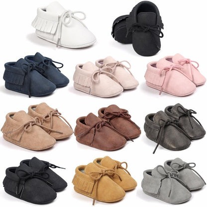 Unisex baby tassel moccasins, anti-slip soft sole, toddler footwear in beige faux suede.