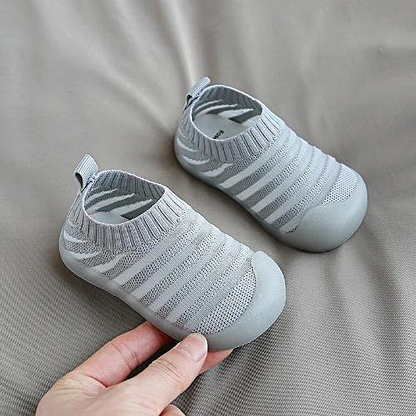 Side view of unisex infant footwear, soft sole toddler shoes, providing excellent non-slip grip and breathability