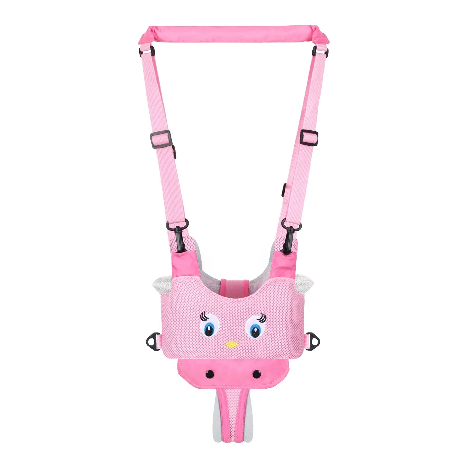 Baby walking harness being used by a smiling toddler outdoors, encouraging independent walking