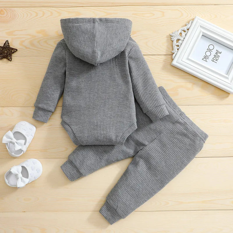 Unisex baby in warm fall winter set, bodysuit & pants, perfect for cozy newborn style