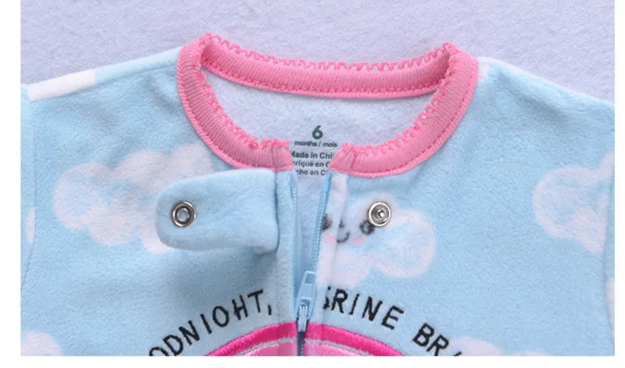 Light green fleece footed sleeper, unisex baby clothes, cozy and comfortable for newborn sleep.